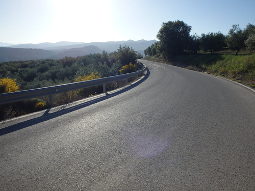 Riding into the Sun on the road to Br&aacute;cana.